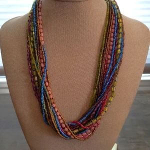 Multi-colored bead strand necklace